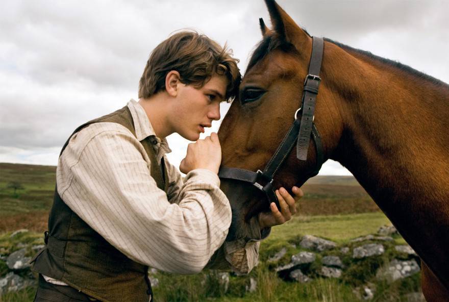 "WAR HORSE" DM-AC-00034 Albert (Jeremy Irvine) and his horse Joey are featured in this scene from DreamWorks Pictures' "War Horse", director Steven Spielberg's epic adventure for audiences of all ages, and an unforgettable odyssey through courage, friendship, discovery and wonder. Ph: Andrew Cooper, SMPSP ©DreamWorks II Distribution Co., LLC.  All Rights Reserved.