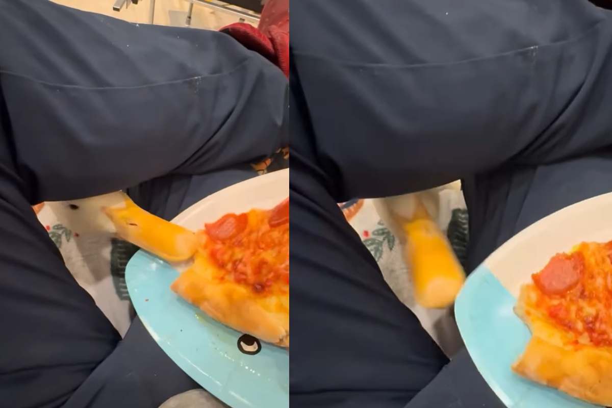 papera ruba la pizza dal piatto