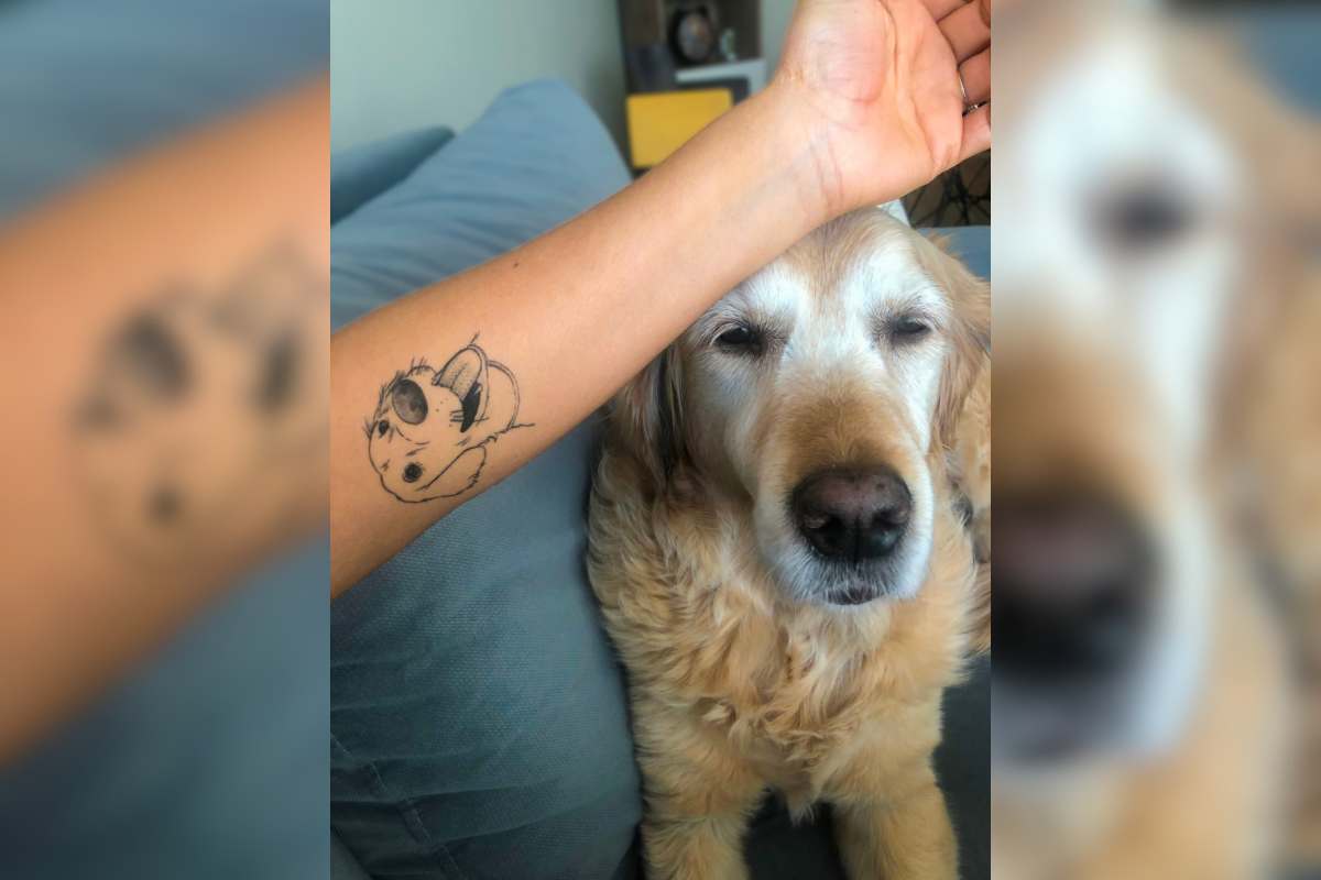 braccio tatuaggio e cane